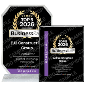 Award plaque and certificate reading 'Top 5 2026' for EJ2 Construction Group, contractor, with laurel wreaths and Momentum branding.