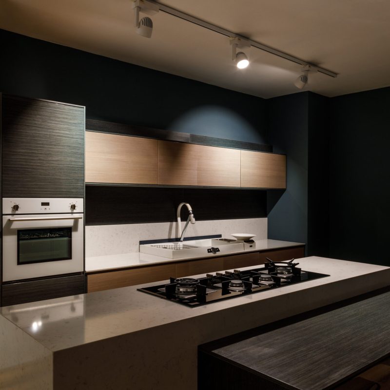 Interior of modern kitchen with stove on counter Interior of modern kitchen with stove on counter
